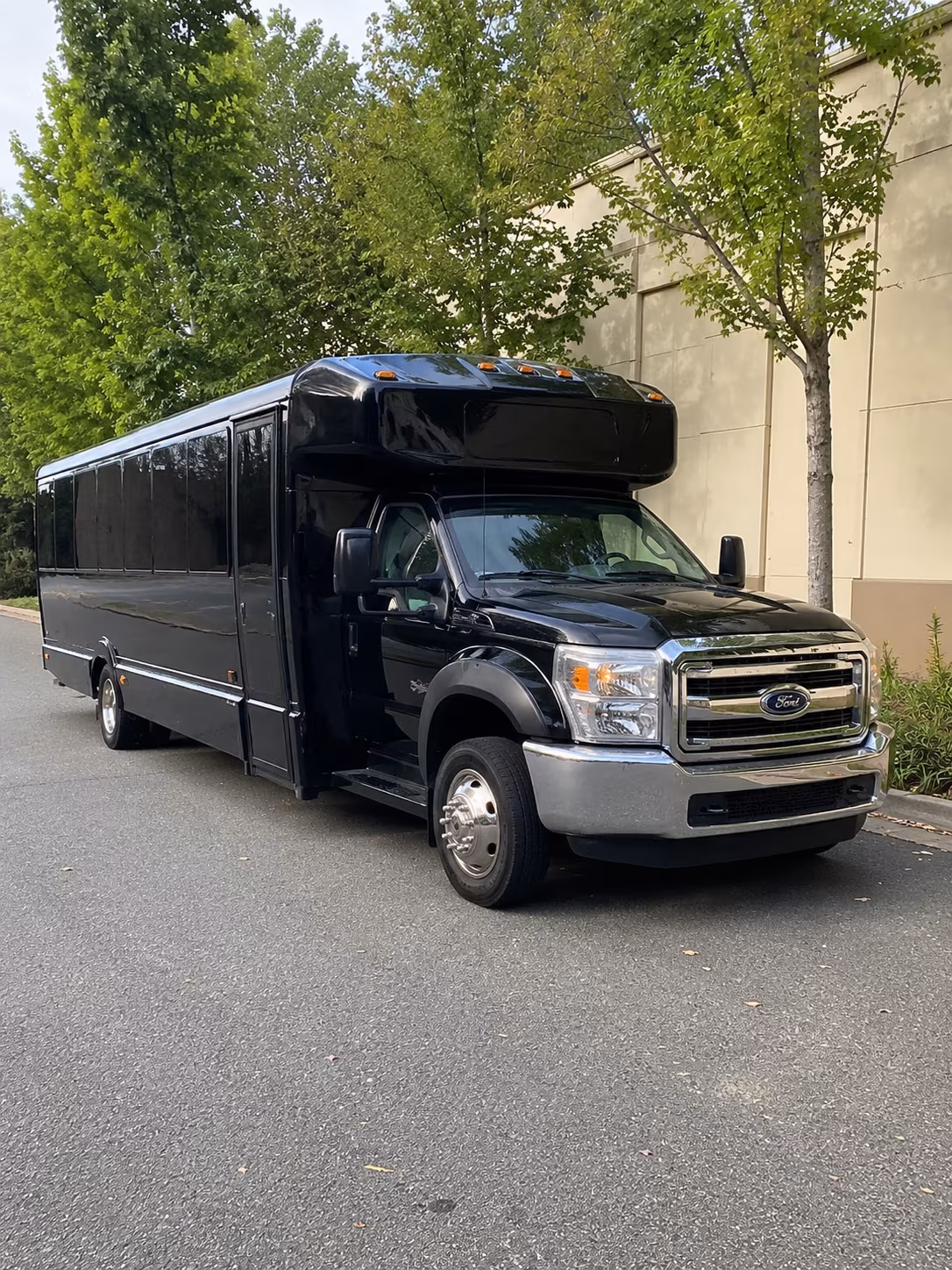 Friends laughing during a party bus celebration in Great Falls