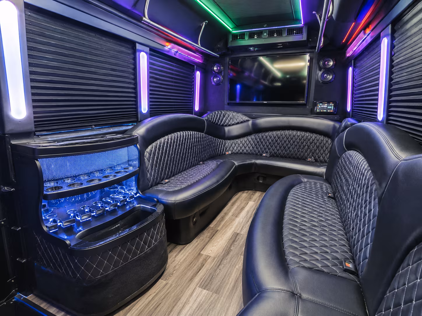 Wedding guests seated inside a party bus serving Great Falls